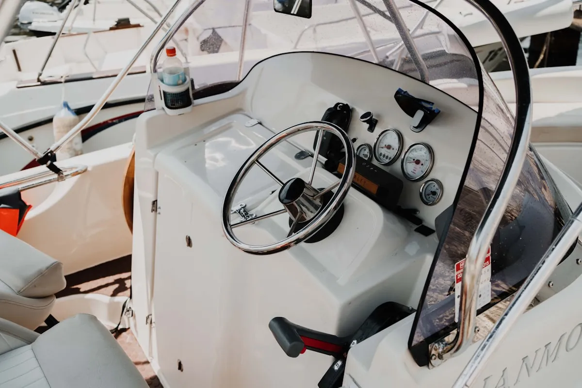 Boat cockpit with steering wheel and navigation instruments